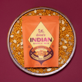 doosra Indian snack mix package on a bed of chickpeas and peanuts with a purple background