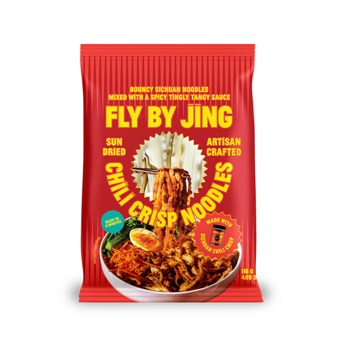 Red package of Fly By Jing chili crisp noodles with yellow text on a white background