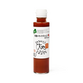 Bottle of ketchup with a white label on a white background